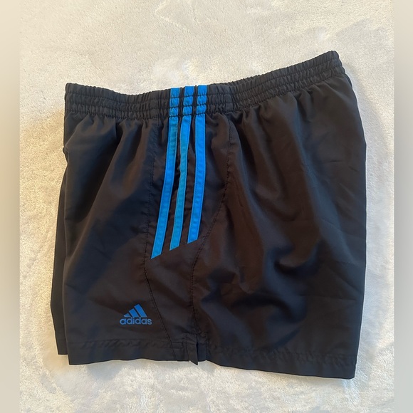 Adidas women’s medium running shorts. Black with 3 stripe in blue. EUC - Picture 7 of 7